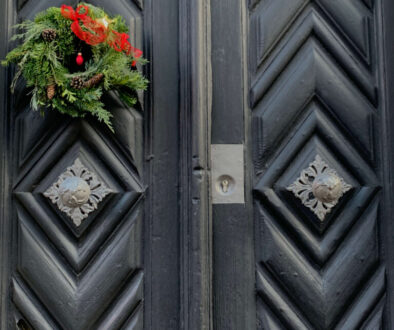 Green Christmas Decor on Black Door